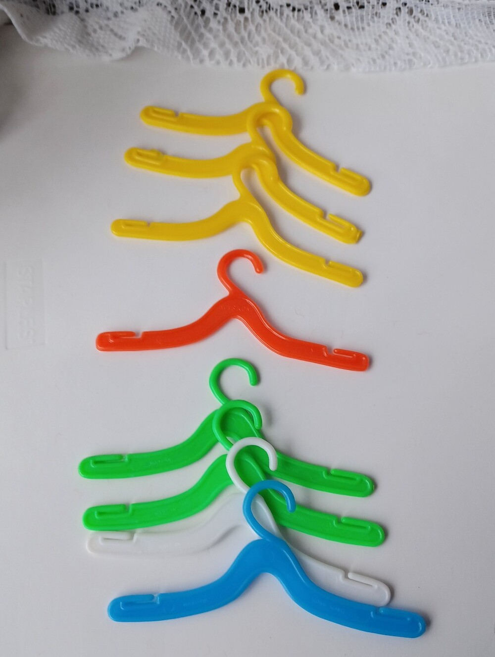SET OF (8) ASSORTED COLORS 3.5" DOLL CLOTHES HANGERS 5 OF 8 MARKED HONG KONG